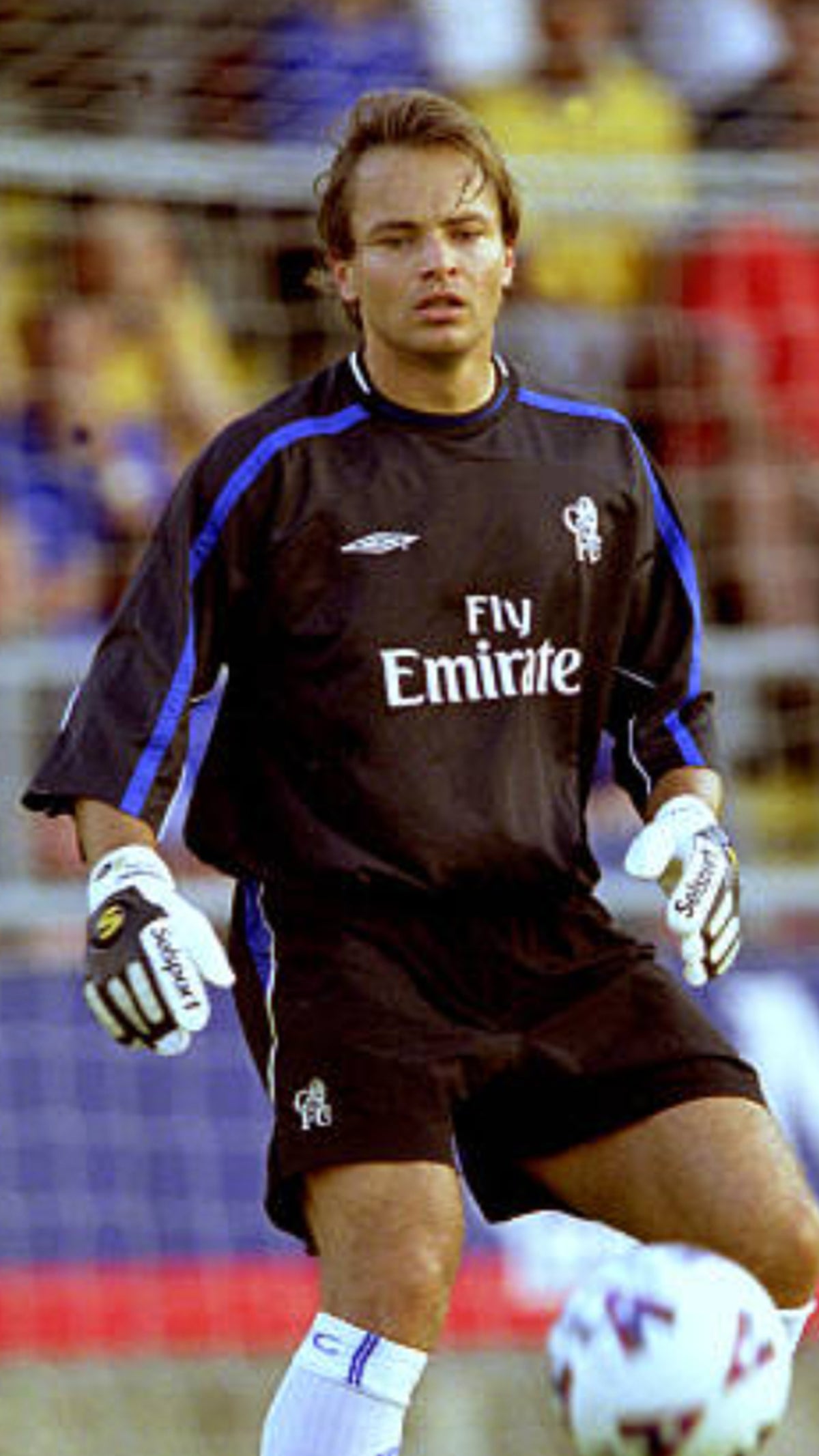 Mark Bosnich International goalkeeper for Australia and Chelsea wearing a black goalkeeper shirt and Selsport goalkeeper gloves