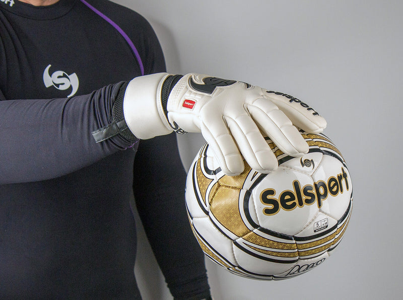 Seslport Wrappa Classic Professional  Latex Goalkeeper gloves negative cut  glove holding a selsport ball