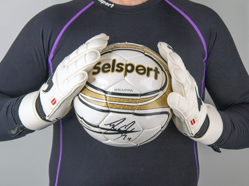 Wrappa Classic Selsport Professional rollfinger goalkeeper gloves holding a football