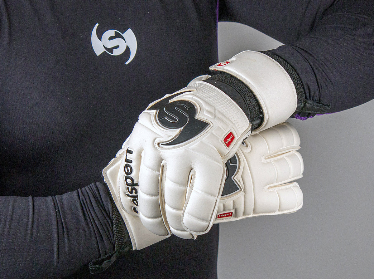 Wrappa Classic Selsport Professional rollfinger goalkeeper gloves being put on the wrists